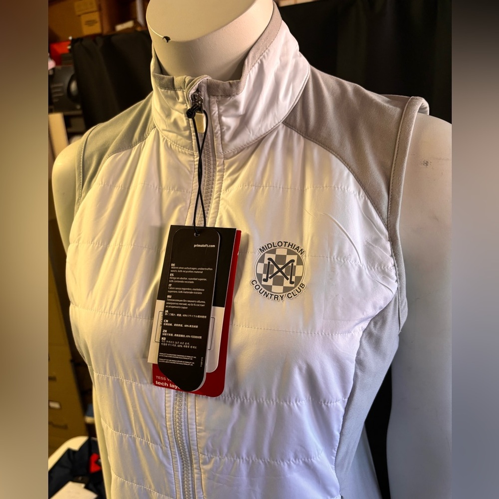 New women’s small Zero Restriction golf vest